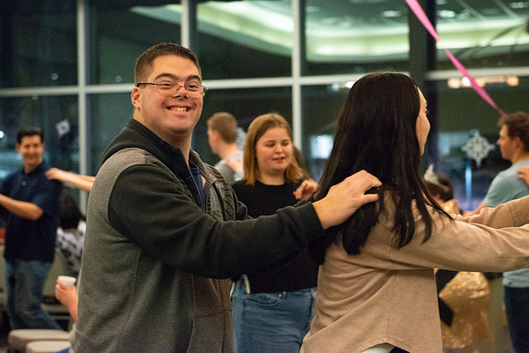 Students celebrate winter with karaoke, dancing, and games in the Manwaring Center.