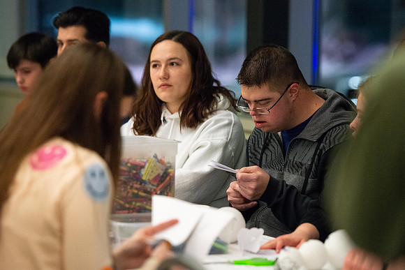 Students celebrate winter with karaoke, dancing, and games in the Manwaring Center.
