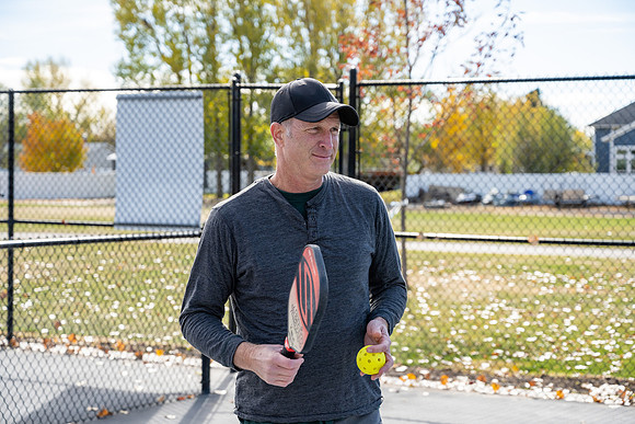 Dinking around playing pickleball for the HR Wellness Video.