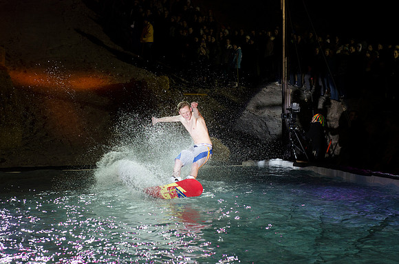 Students at Brigham Young University-Idaho take part in the annual Pond Skimming event held on campus at BYU-Idaho. Students wait in the cold or take the daring attempt to skim a pool of water using a