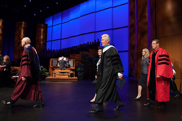 Elder Dallin H. Oaks, President Dieter F. Uchtdorf, and President Gilbert, walk on stage during the processional. Photo by Tyler Rickenbach