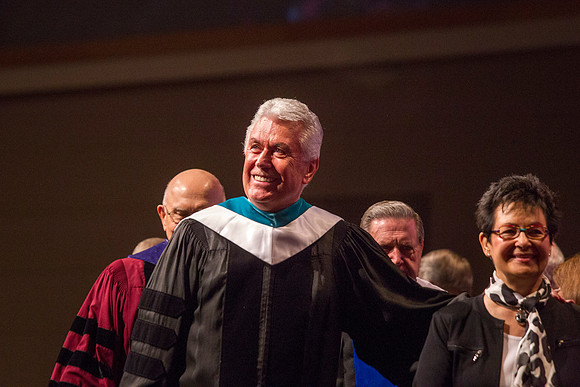 President Uchtdorf smiles as he says goodbye to students, friends and family who gathered in the ICenter for the Inauguration.