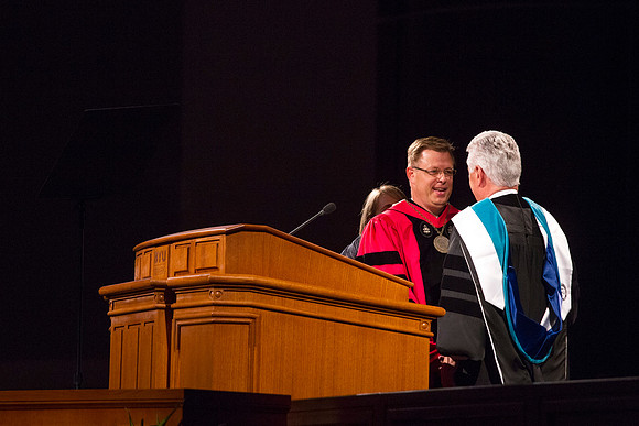 President Dieter F. Uchtdorf presents President Gilbert with a Presidential Medallion during the Inauguration Ceremony.