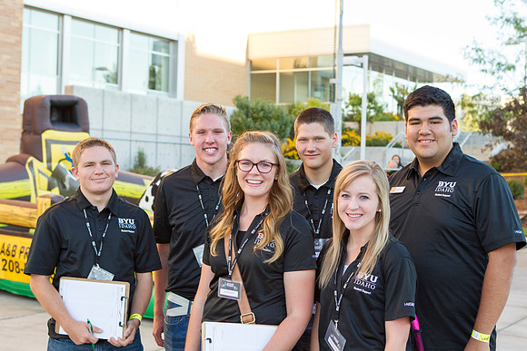 A student support team gathers outside the MC just before INight begins.