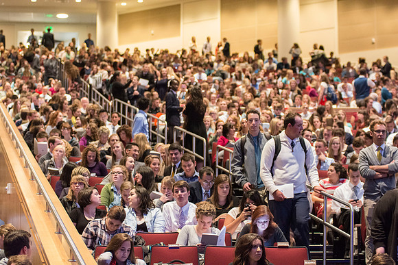 Students find their seats before the Processional begins.