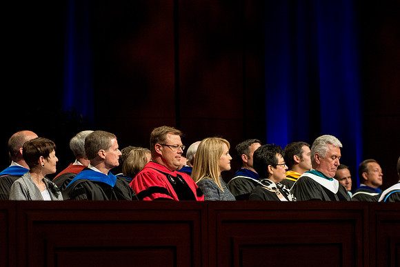 Elder and Sister Bednar, President and Sister Gilbert, and President and Sister Uchtdorf on the stand.
