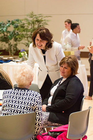 Guests, familiy and friends congratulate President and Sister Gilbert after the Inauguration Ceremony.