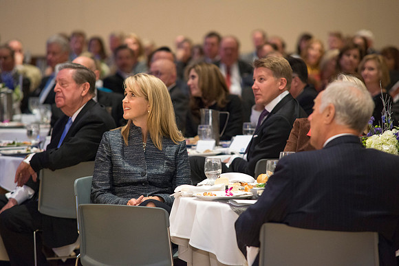 Sister Gilbert looking on as her husband speaks at the luncheon. Inauguration luncheon in the Manwaring Center Grand Ballroom.