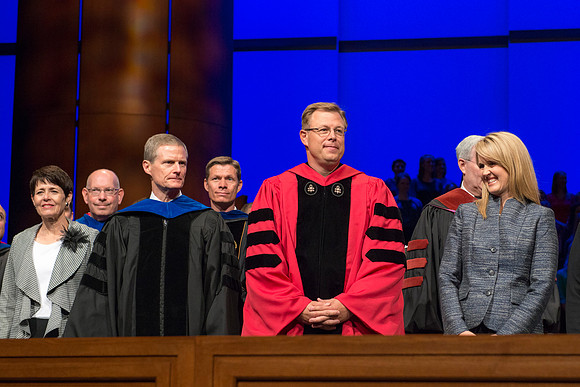 Elder and Sister David A. Bednar, with President and Sister Gilbert.