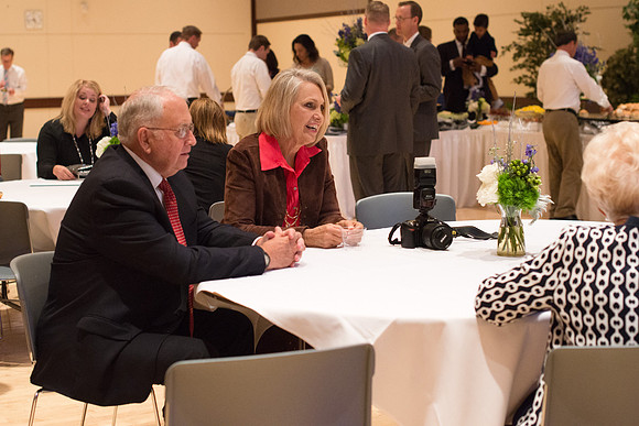 Guests, familiy and friends congratulate President and Sister Gilbert after the Inauguration Ceremony.