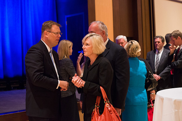 Guests, familiy and friends congratulate President and Sister Gilbert after the Inauguration Ceremony.