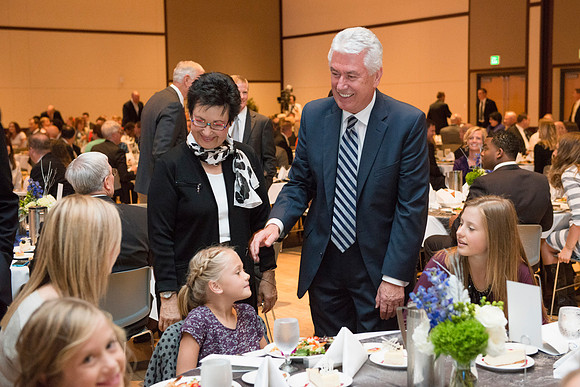 Inauguration luncheon in the Manwaring Center Grand Ballroom. President Uchtdorf greets members of President Gilbert's family.