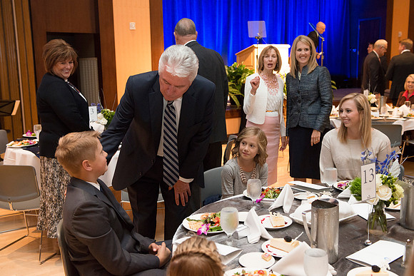 Inauguration luncheon in the Manwaring Center Grand Ballroom. President Uchtdorf greets members of President Gilbert's family.