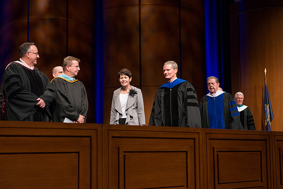 Elder and Sister Bednar followed by Elder Holland.