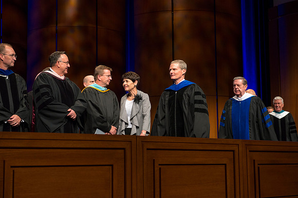 Processional: Elder and Sister Bednar followed by Elder Holland.