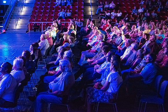 Jim Curry performs songs of John Denver at the Hart Auditorium.