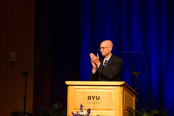 Henry J. Erying, BYU-Idaho Academic Vice President, applauds President Gilbert during the Inaugural Luncheon.