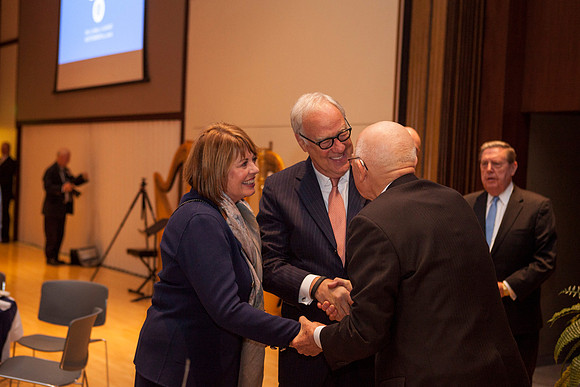 Elder Dallin H. Oaks converses with some friends during the Inaugural Luncheon.