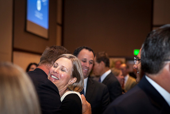 President Clark G. Gilbert greets a long lost friend after the Inaugural Luncheon.