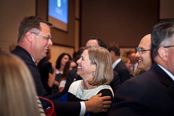 President Clark G. Gilbert greets a long lost friend after the Inaugural Luncheon.