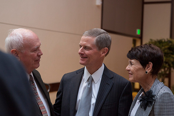 Elder Bednar converses with a friend after the Inaugural Luncheon.