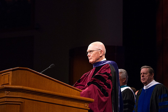 Elder Oaks begins conducting the Inauguration held in the ICenter.