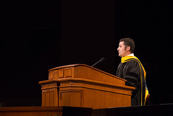 Forest J. Gahn from the Faculty Assocation, greets President Gilbert during the Inauguration.