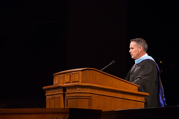 Steven J. Davis from the Alumni Assocation greets President Gilbert during the Inauguration.