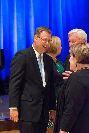 Guests, familiy and friends congratulate President and Sister Gilbert after the Inauguration Ceremony.