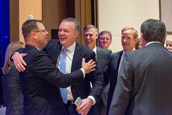 Guests, familiy and friends congratulate President and Sister Gilbert after the Inauguration Ceremony.