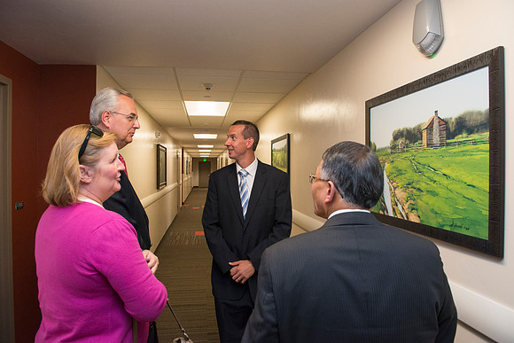 Elder and Sister Hamula take a tour of Centre Square and admire some of the Church History art work done by artist Al Rounds.