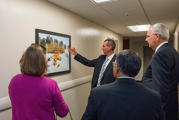 Elder and Sister Hamula take a tour of Centre Square and admire some of the Church History art work done by artist Al Rounds.