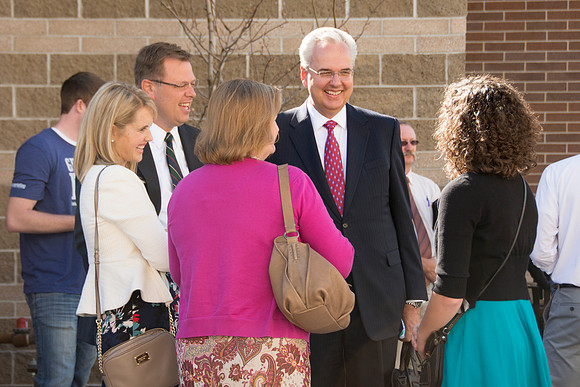 Elder James J. Hamula, of the First Quorum of the Seventy speaks, dedicates the new Center Square apartments.