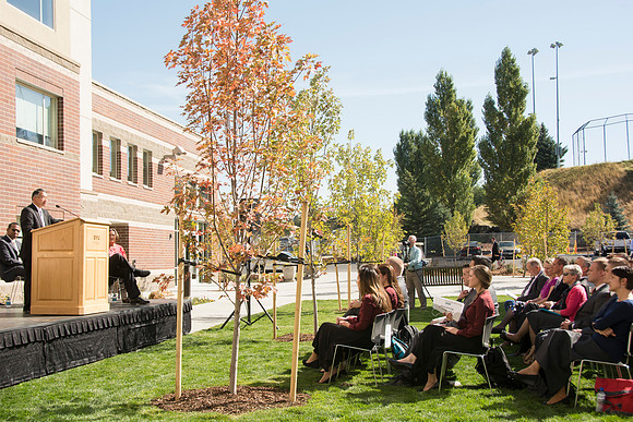 Elder James J. Hamula, of the First Quorum of the Seventy speaks, dedicates the new Center Square apartments.