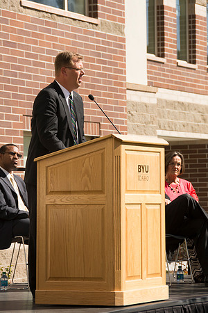 President Gilbert gives remarks at the dedication of the Center Square Apartments.