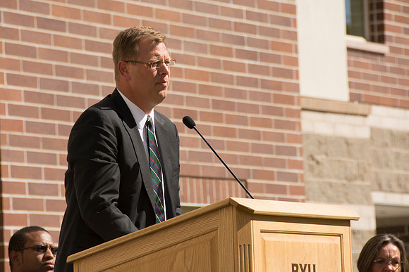 President Gilbert gives remarks at the dedication of the Center Square Apartments.