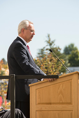 Elder James J. Hamula, of the First Quorum of the Seventy speaks, dedicates the new Center Square apartments.
