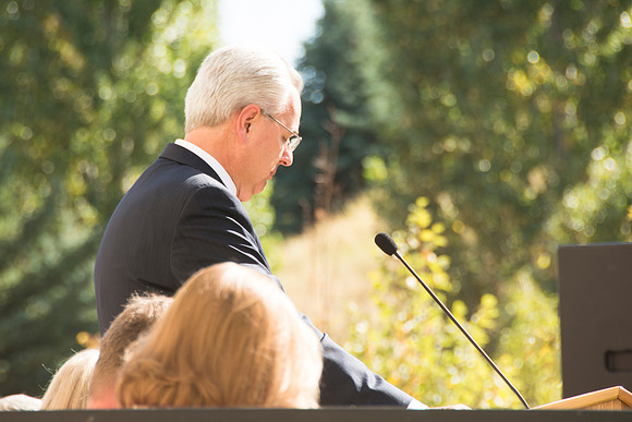 Elder James J. Hamula, of the First Quorum of the Seventy speaks, dedicates the new Center Square apartments.
