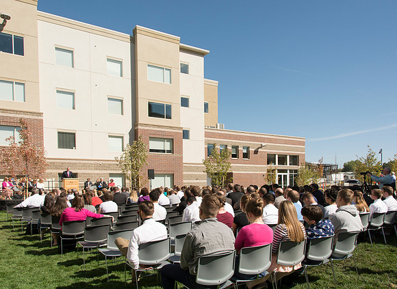 Elder James J. Hamula, of the First Quorum of the Seventy speaks, dedicates the new Center Square apartments.