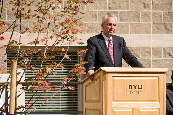 Elder James J. Hamula, of the First Quorum of the Seventy speaks, dedicates the new Center Square apartments.