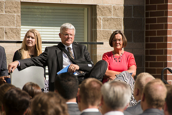 Elder James J. Hamula, of the First Quorum of the Seventy speaks, dedicates the new Center Square apartments.
