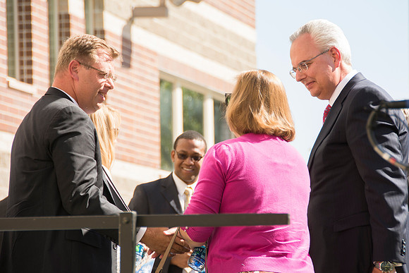 Elder James J. Hamula, of the First Quorum of the Seventy speaks, dedicates the new Center Square apartments.