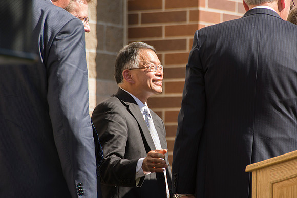 Elder James J. Hamula, of the First Quorum of the Seventy speaks, dedicates the new Center Square apartments.