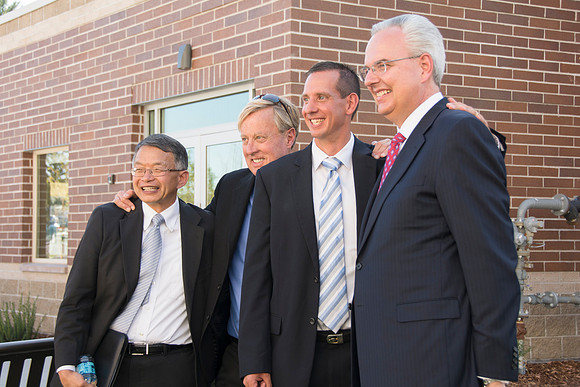 Elder James J. Hamula, of the First Quorum of the Seventy speaks, dedicates the new Center Square apartments.