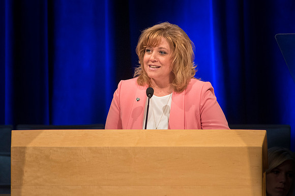 Euleza Hymas, Student Activities Advisor, speaks at devotional during the summer break.