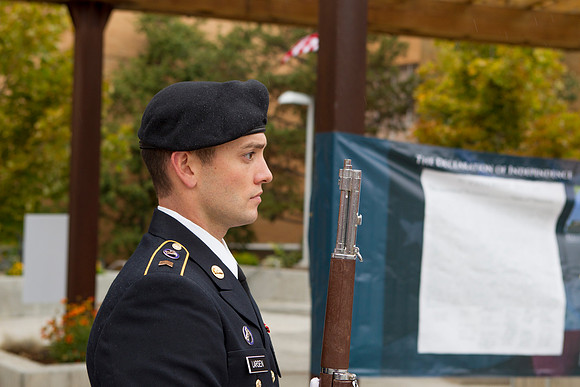 Cadet Larsen salutes the American Flag during the Constitution Day Ceremony.