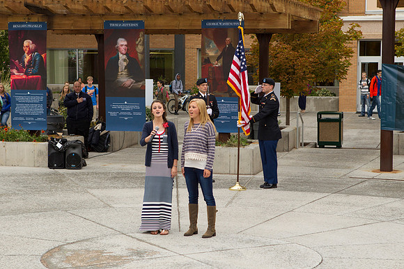Two BYU-Idaho students sing the Star Spangled Banner during the Constitution Day Ceremony.