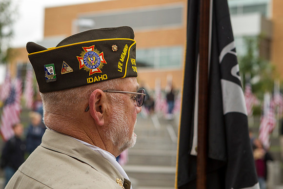 A member of the VFW from Rexburg helps the ROTC Cadets during the Constitution Day Ceremony.