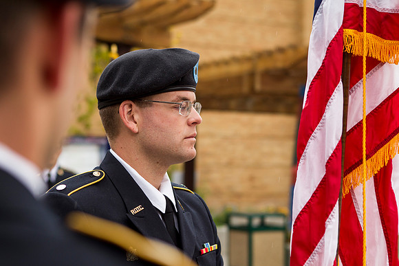 Cadet Fackrell honors the American Flag during the Constitution Day Ceremony.