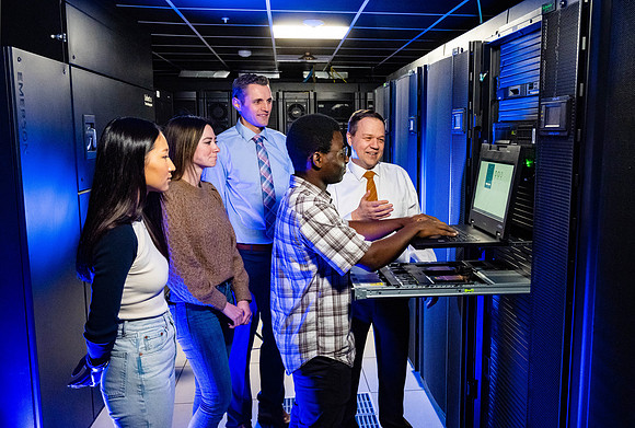 Computer Information Technology students in the server room in the Smith Building.